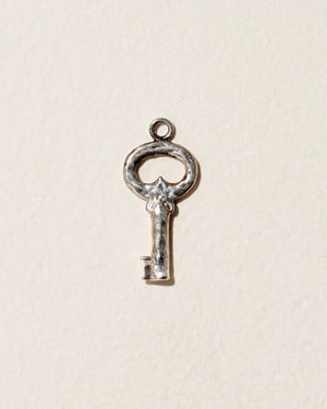 Fini’s Key Charm