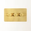 Lucian three gang dimmer switch in top brass