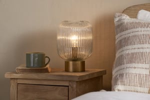 nkuku Rizal Fluted Glass Bedside Table Lamp | Lamps | One Size | Antique Brass & Clear
