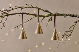 nkuku Manya Metal Bell Baubles Set Of 3 | Christmas Decorations | Brass