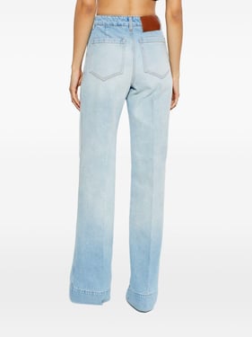 Alina light blue cotton denim flared jeans with front patch pockets and logo embroidery.