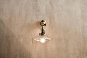 nkuku Zowie Recycled Glass Wall Light | Lights | Clear | Antique Brass