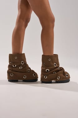 AKIRA Gold Fable Grommet Embellished Flat Bootie | Brown | Size 11