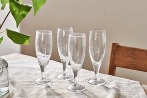 nkuku Yala Hammered Champagne Glass Set Of 4 | Glassware | Clear