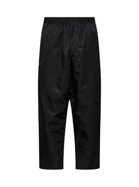 PRADA ABBIGLIAMENTO | Black Re-Nylon trousers with elasticated waistband | Man | M