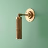 Quantum single wall light in antiqued brass