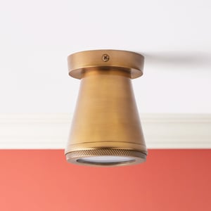 Malton flush light in antiqued brass