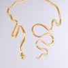 AKIRA Winding Snake Statement Necklace