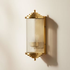 Deco Baby Roddy IP44 rated wall light in brass and glass