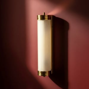 Long Roddy IP44 wall light in brass and frosted glass rods