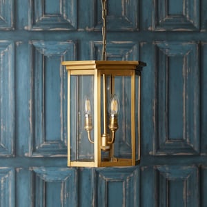 Dontanello pendant light in brass and clear glass