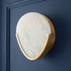 Plectrum wall light in alabaster
