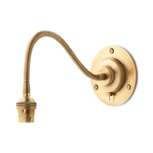 Lissome wall fitting in antiqued brass