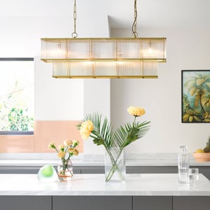 Odin chandelier in brass with glass rods