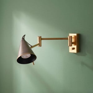 Conrad articulated wall light in brass with bronze hood
