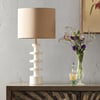 Spool table lamp in white lacquered wood