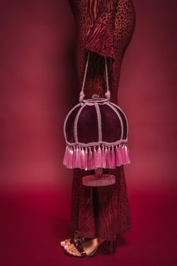 AKIRA Keep The Lights Off Tassel Purse
