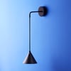 Sway wall light in black