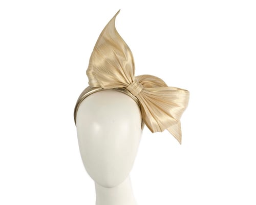 Gold bow fascinator by Cupids Millinery