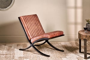 nkuku Narwana Ribbed Leather Lounger | Seating | One Size | Aged Leather & Iron