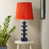 Spool table lamp in deep blue lacquered wood
