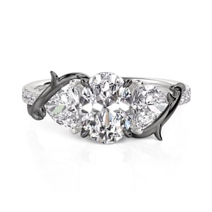 Jeulia Dark Thorns Two Tone Three Stone Engagement Ring with Twist Band