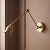 Pick wall light in brass