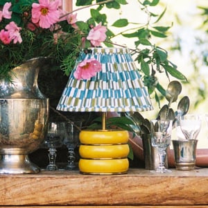 Holleder rechargeable table lamp in sand by the Novogratz