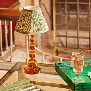Tiny Aurora rechargeable table lamp in amber