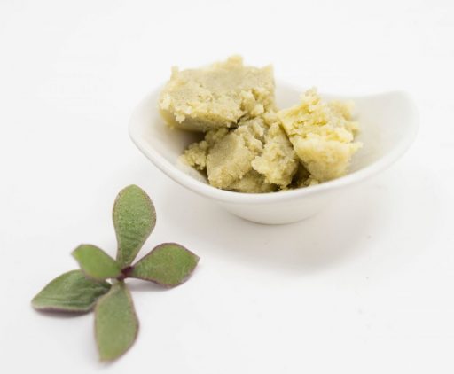 Raw Shea butter in dish