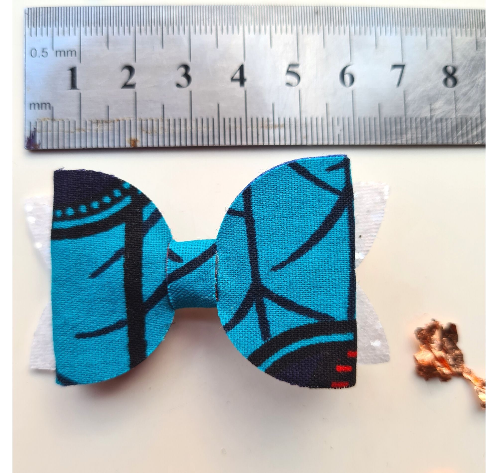 Hair Bows in Blue African Wax Print and White Glitter Fabric