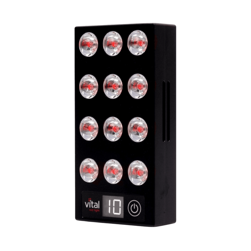 A rectangular device with 12 circular LED lights and a digital display showing the number 10, designed for at-home rejuvenation. The "Vital Elite" power button is conveniently located beneath the display, making this red light therapy device an essential addition to any home set-up.