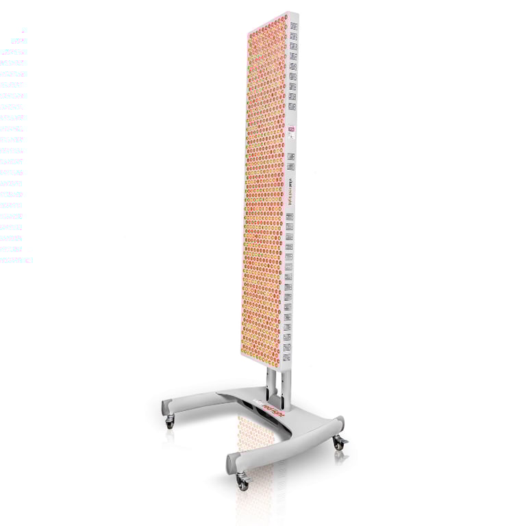 Vital Red LIght. Red Light Therapy. A tall, rectangular LED light therapy panel on a wheeled stand, emitting red and near-infrared light.