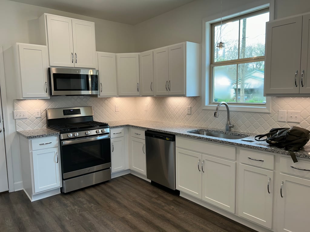 Tenant-ready kitchen with all appliances installed.