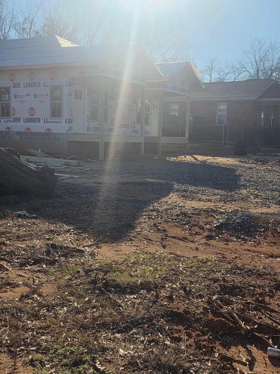 Duplex with windows and front porch installed