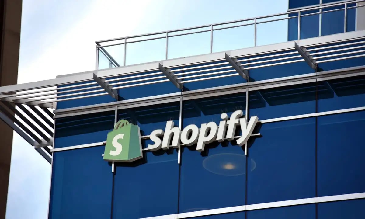 TechDogs-"An Image Showing The Office Building With The Shopify Logo"