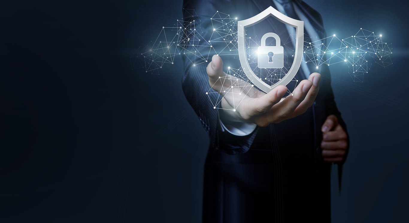 TechDogs-"An Image Showing Cybersecurity Shield With Digital Network"