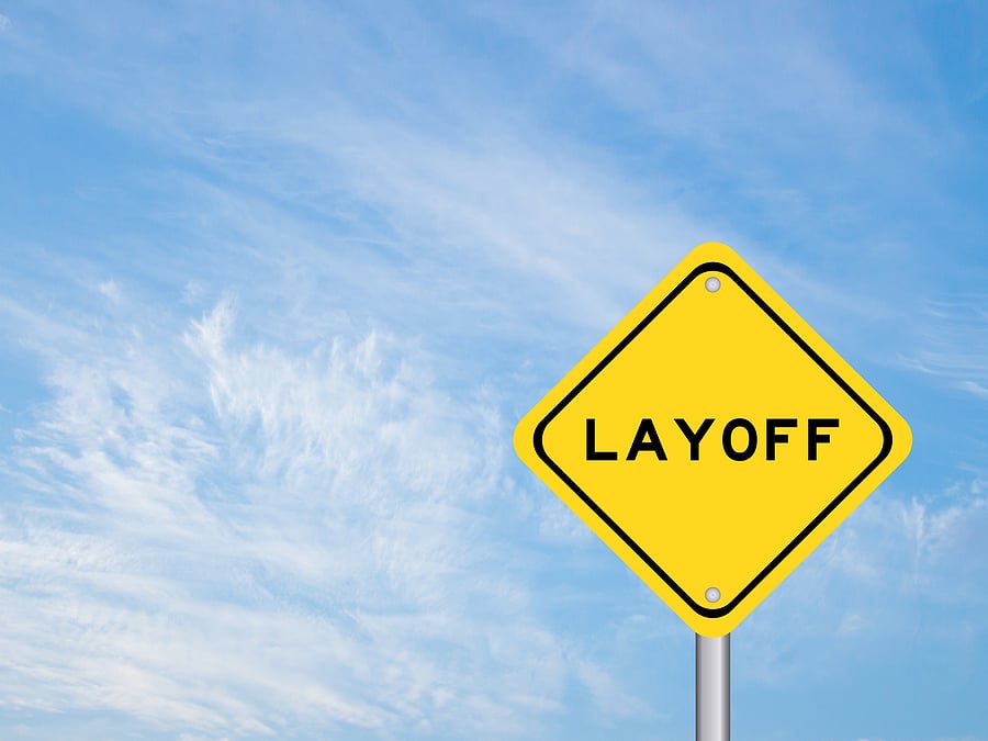TechDogs-"An Image Showing A Board With "Layoff" Written"