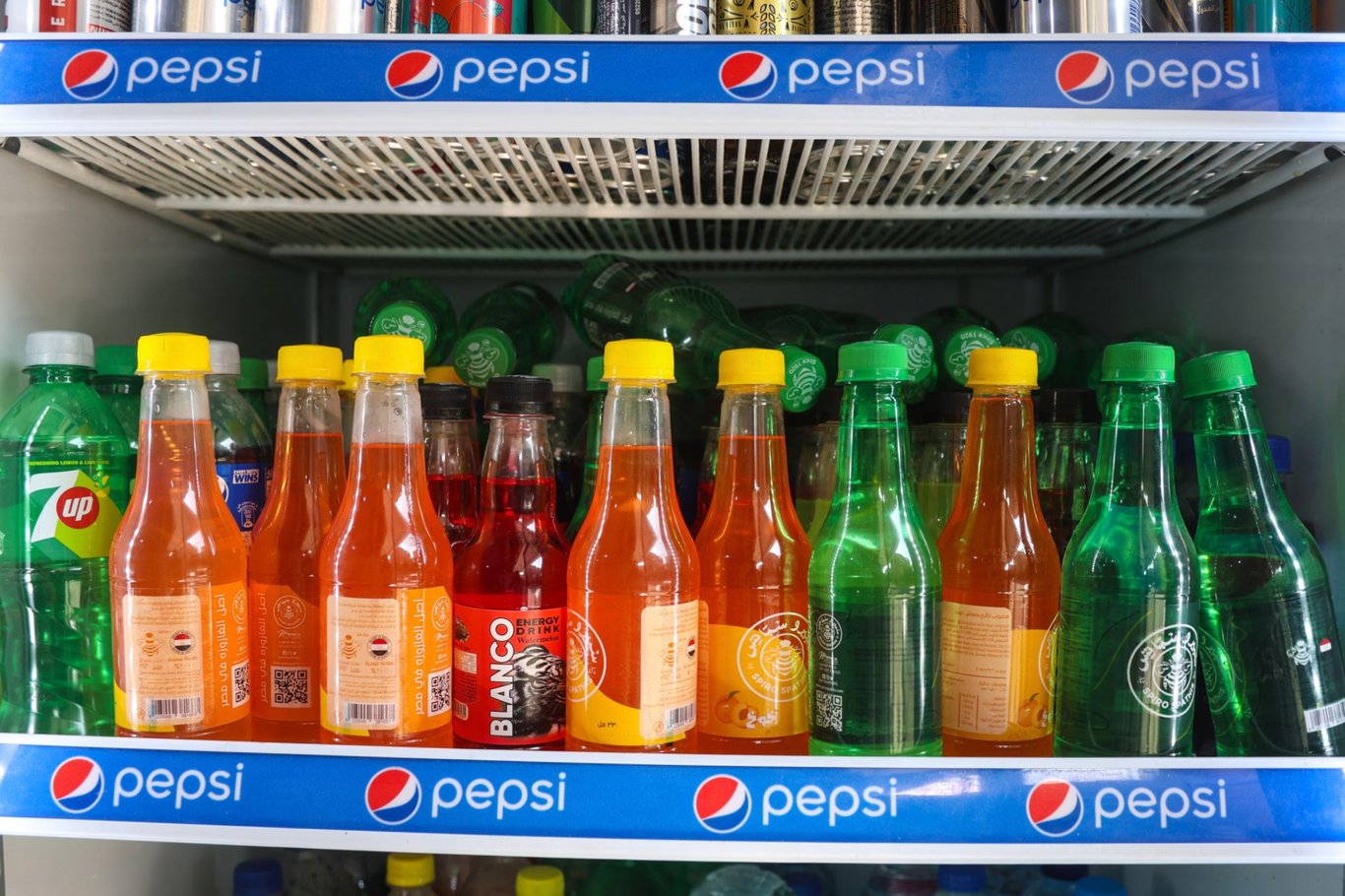 TechDogs-"PepsiCo's Soft Drink Products Lined Up In A Refrigerator"