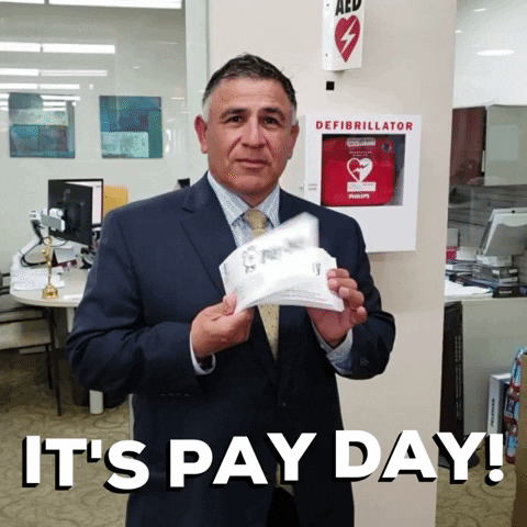 TechDogs-"Payroll And Compensation Compliance"-"A Gif Of A Man Holding Paycheck With A Text - It's Pay Day!"