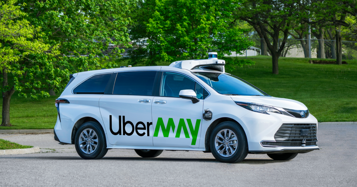 TechDogs-"An Image Of A May Mobility-Uber Robotaxi"