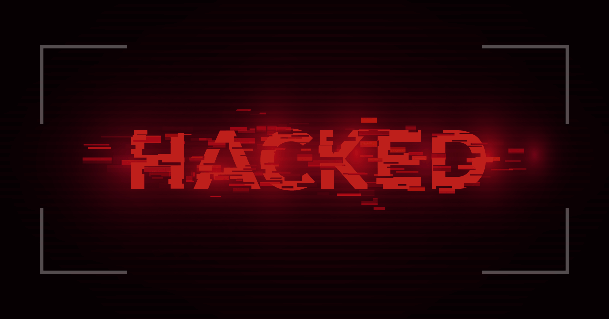 TechDogs-"An Image That Reads "Hacked" Meant To Denote A Cyber Attack"