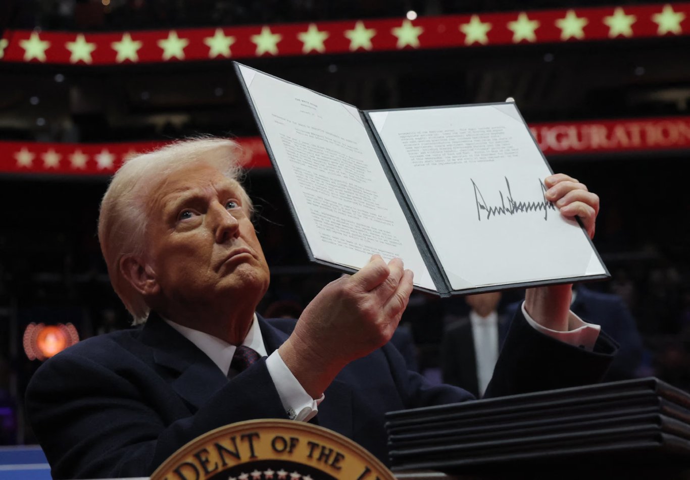 TechDogs-"An Image Of President Trump Showing An Executive Order"
