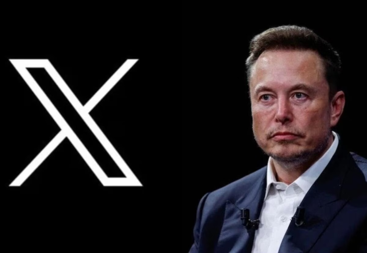 TechDogs-"An Image Showing Elon Musk With The X Platform Logo In The Background"