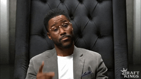 TechDogs-"Build A Unified Digital Asset Ecosystem"-"A Gid Of A Man Smiling And Thoughtfully Tapping His Head"