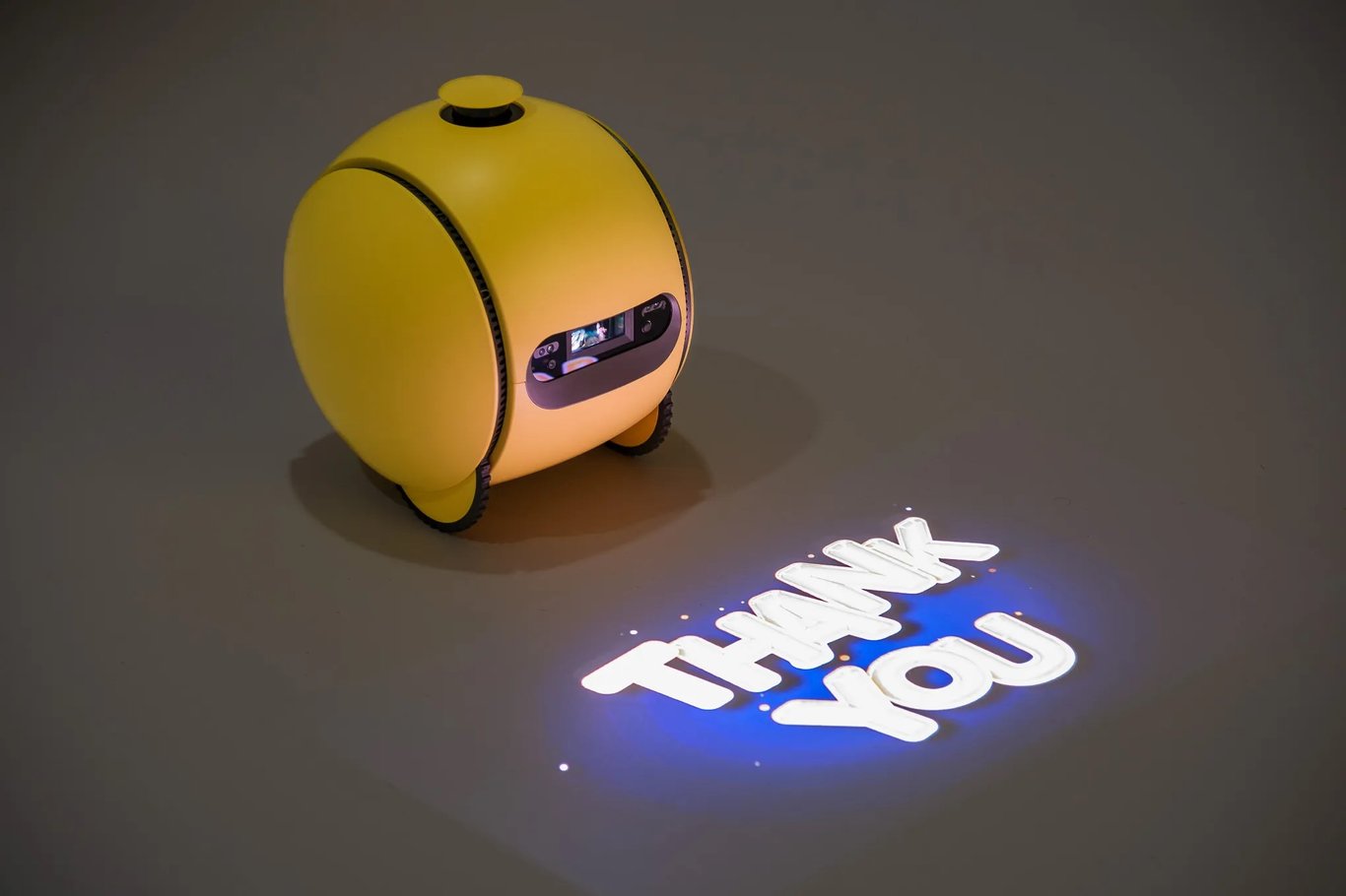 TechDogs-"Built‑In Projector"-"Samsung Ballie Projects 'Thank You' Text Onto Floor Using Built-In Projector"
