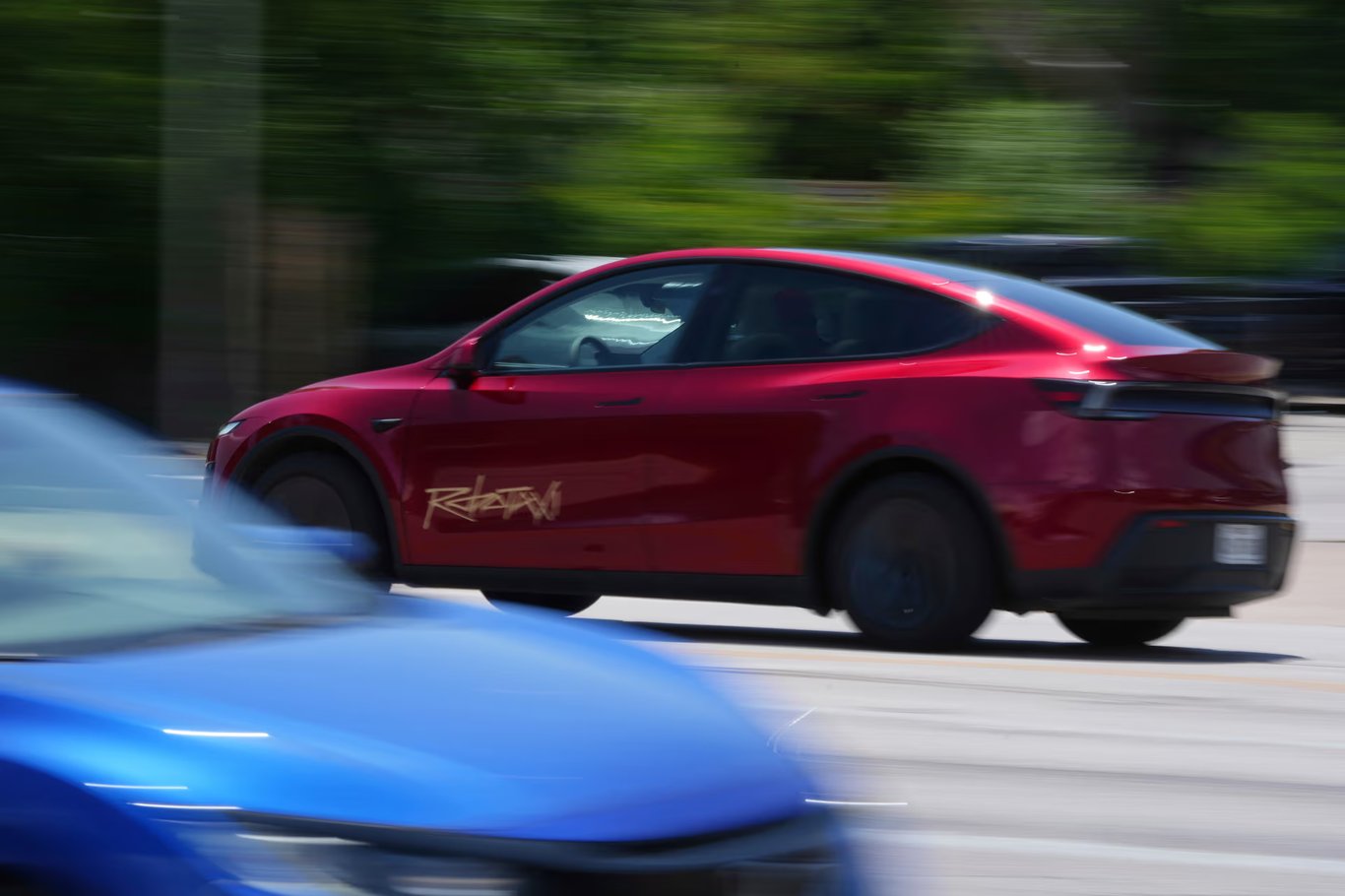 TechDogs-"An Image Of A Tesla Robotaxi In Operation"
