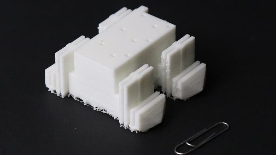 TechDogs-"Robot 3D-Printed Upside-Down, Walks Right Off The Printer"-"An Image Showing The 67-mm-Long (2.6-in) Demonstrator Robot With A Paper Clip For Scale"