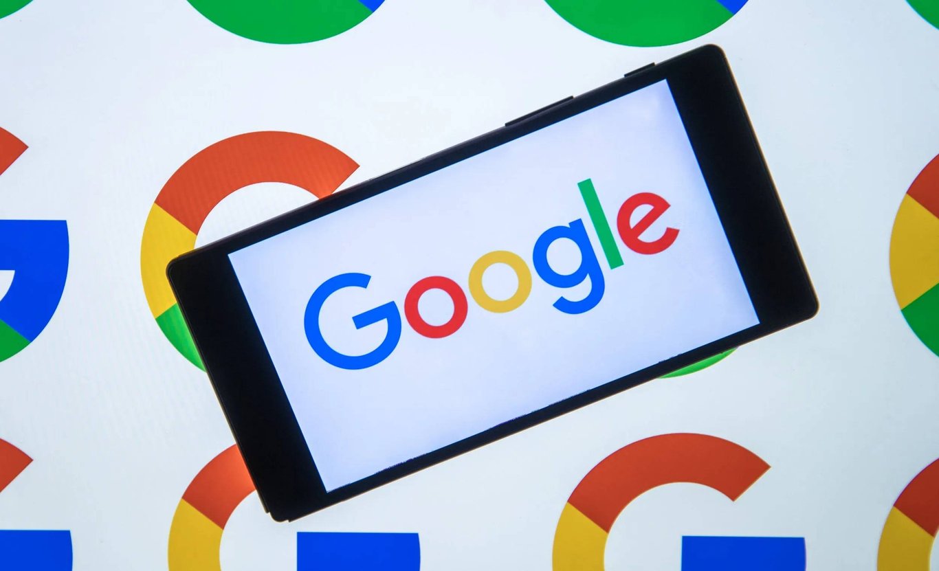 TechDogs-"An Image Of Google's Logo On A Phone"