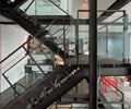 Preview of 56 Piles - Image 5: Airport Terminal, Terminal, glass interior, structural steel , steel stair.